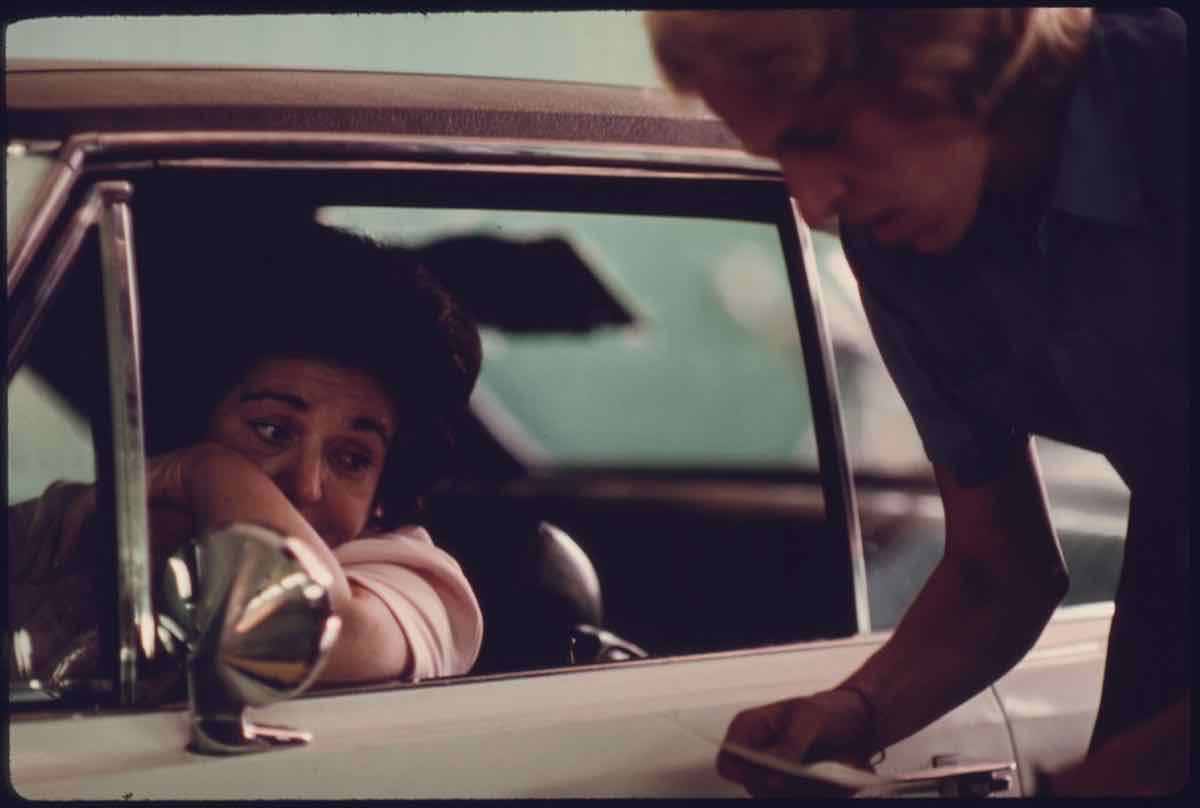 A driver hears that her car failed the emission test, Norwood, Ohio, 1975